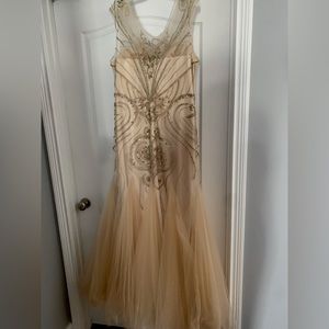 gold dress does have some gems falling off but can barely notice.